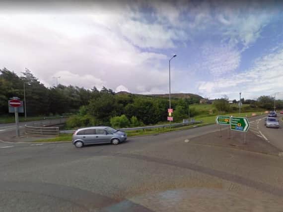 A 2-year-old girl is in a serious condition after falling from a BMW X5 on the A56 in Lancashire before being hit by another vehicle. Pic: Google Street View