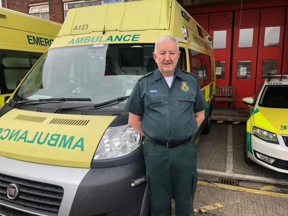 Mick pictured this week outside Preston Ambulance Station