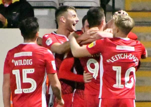 Morecambe hope to be celebrating on and off the pitch in the run-up to Christmas