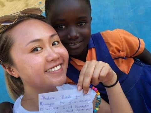 Michelle Chan with one of the children in Ghana