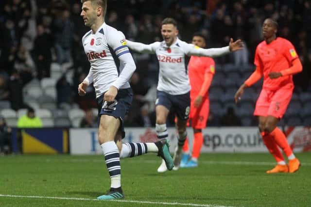 Paul Gallagher scores from the penalty spot against Huddersfield at Deepdale