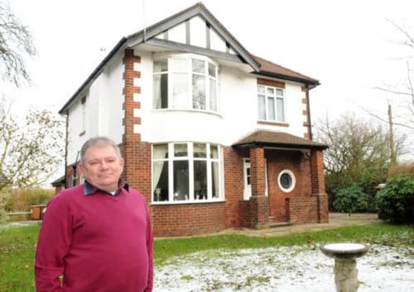 Philip Townley outside his home on Highrigg Drive