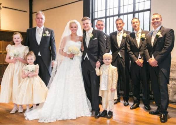 Wedding party: Michael Farrar and Nicole Putman with their groomsmen and bridesmaids on their special day