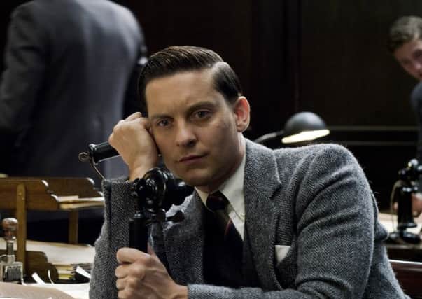 Tobey Maguire as Nick Carraway in Warner Bros. Pictures and Village Roadshow Pictures drama THE GREAT GATSBY