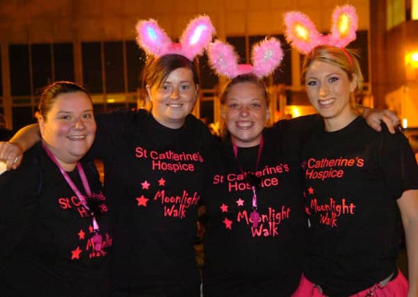 From left, Debbies Coupe, Nikita Watson, Shelly Carey and Dawn McAleenan from Lowden House, Preston take part in the St Catherines Hospice Moonlight Walk