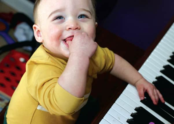 Baby pianist for Mini Mozart Lancashire Sinfonietta