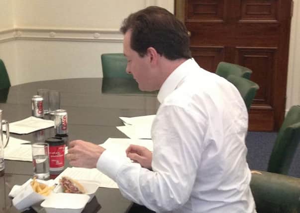 George Osborne eating a burger and chips