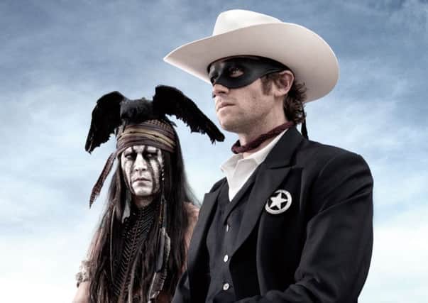 The Lone Ranger. Pictured: JOHNNY DEPP as Tonto and ARMIE HAMMER as John Reid (Lone Ranger)