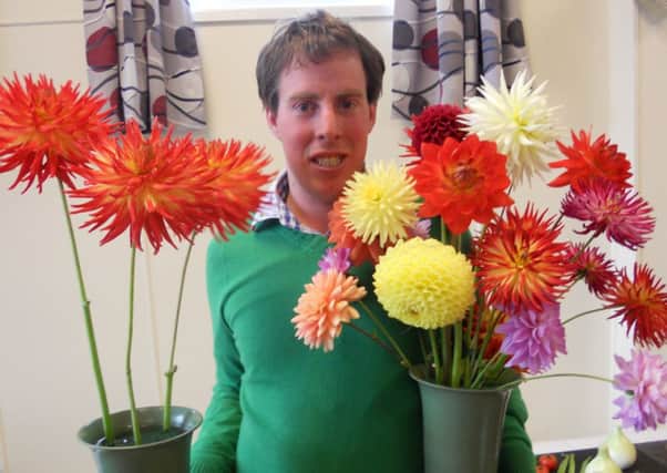 Beautiful bouquets: Andrew Thompson with some of his award winning blooms