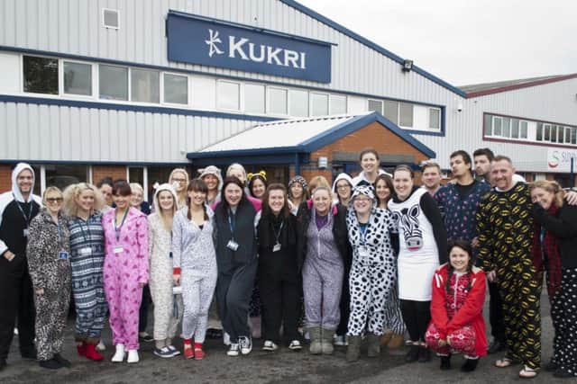 Staff at the Kukri HQ in Preston raised £1,020 for Children in Need
