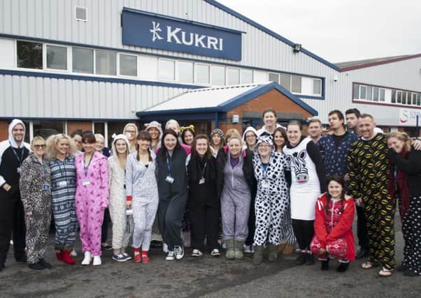 Staff at the Kukri HQ in Preston raised £1,020 for Children in Need