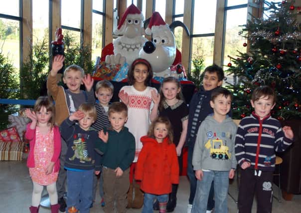 Children who attended the 'Tea with Santa' event at Avenham Park Pavilion with the Wallace and Gromit Christmas sledge.