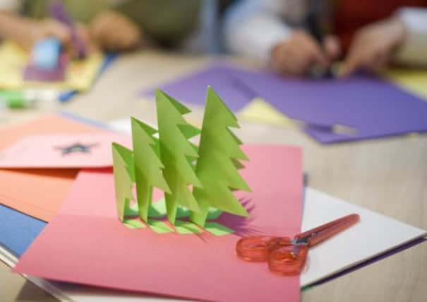 Children making Christmas cards