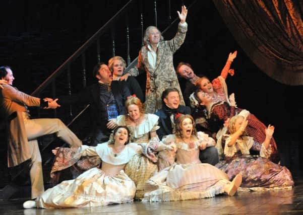 Scrooge (Tommy Steele) finds festive redemption at the Opera House