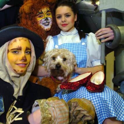 Hannah Britland as Scarecrow (left) in a Brownedge St Mary's High School performance of The Wizard Of Oz