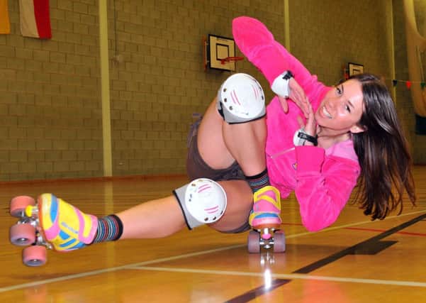 Rachael Disley (Superfunk Roller Disco) carries out a 'coffin' move during the Jubilee Roller Disco held at the Headland Sports Centre. Picture by FRANK REID