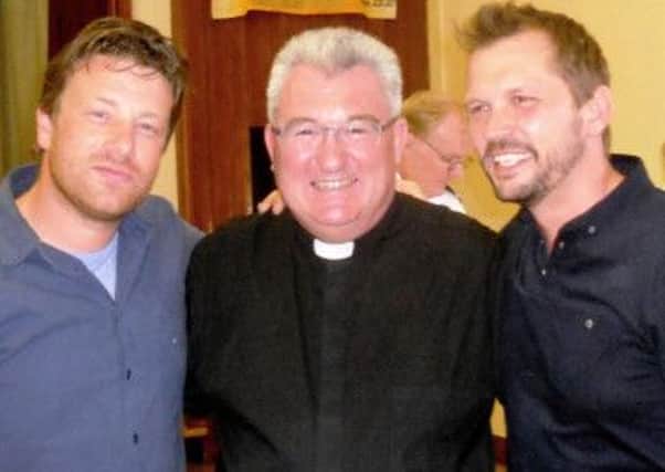 The Vicar, Rev. Shaun Baldwin, with Jamie and Jimmy during filming