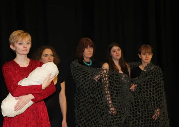 From left, Iphigenia (with baby Orestes), Clytemnestra and the Chorus  from The Tragedy of EuripidesPicture: Glenn Green