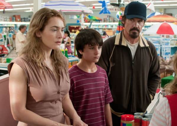 Labor Day: (l-r)  Kate Winslet as Adele, Josh Brolin as Frank and Gattlin Griffith as Henry.