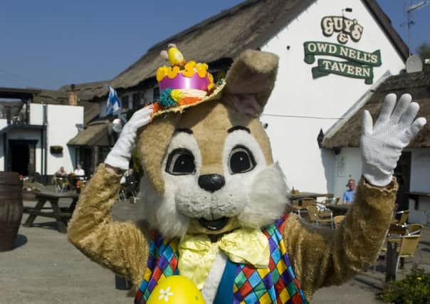 The Easter Bunny at Guys Thatched Hamlet last year. He will return this Sunday