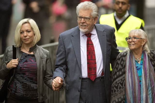 Rolf Harris arrives at court with wife Alwen and daughter Bindi