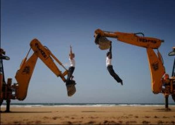 The Motionhouse dancing diggers, which are coming to Tram Sunday in Fleetwood.