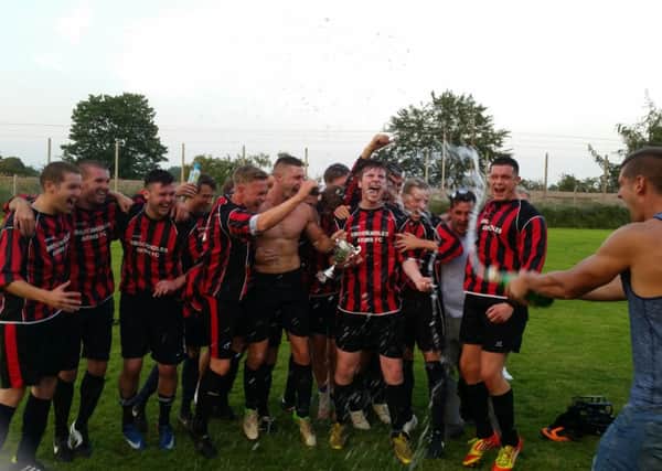 Brockholes Arms celebrate their cup victory