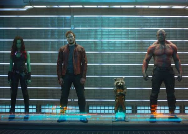 Marvel's: Guardians Of The Galaxy: L to R: Gamora (Zoe Saldana), Peter Quill/Star-Lord (Chris Pratt), Rocket Raccoon (voiced by Bradley Cooper), Drax The Destroyer (Dave Bautista)