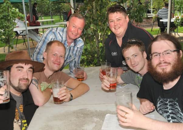From left, William Heyes, Russell Hatton, Peter Rainford, Alex Shaw, David Casterton and Rowan Nookey have fun at Cuerden Park Cider and Beer Festival