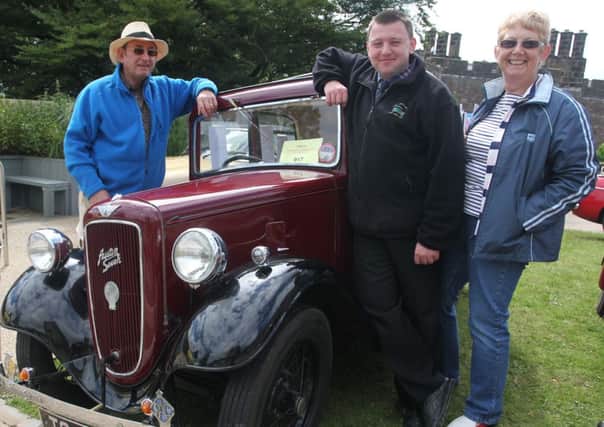 Stan Stuart with his Austin 7 Ruby car along with Andrew Wallin and Carolyn Stuart at the classic car show at Clitheroe Castle.