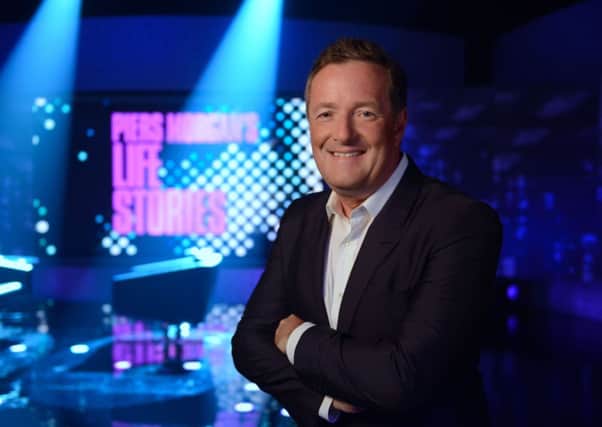 Piers Morgan relishes his celebrity encounters...and even the abuse he gets when flying into Britain