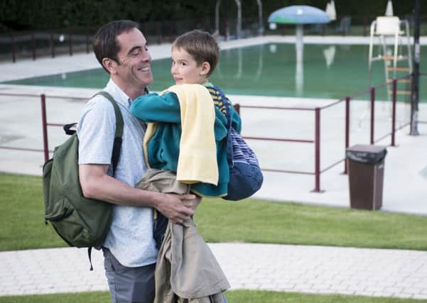 Tony (James Nesbitt) and  son Oliver (Oliver Hunt) share a smile before their world is torn apart