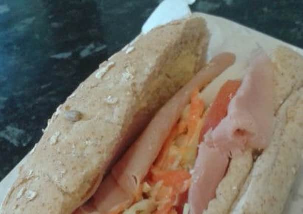 Ham, tomato and coleslaw sandwich