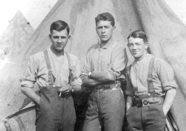 Allen Evans (centre), as a soldier- probably soon after he enlisted at 15 by saying he was 18.
At boot camp in 1914 the recruits had no uniform or rifles at first. They slept in circular bell tents with their feet towards the central pole. historical / world war one / WW1 / 
nigel bernstein of poulton  recorded his granfather's  ( Allen Evans ) recollections - used in the gazette nillenium supplements