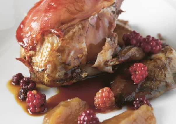 Roast grouse with apple purée, mulled brambles and sloegin juices