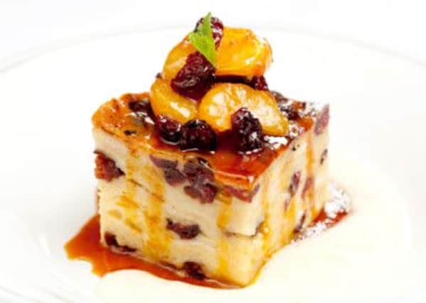 White chocolate and cranberry bread-and-butter pudding with satsuma and cranberry suzette