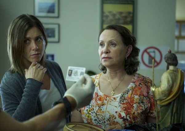 Jennifer Aniston as Claire Bennett and Adriana Barraza as Silvana star in Cake