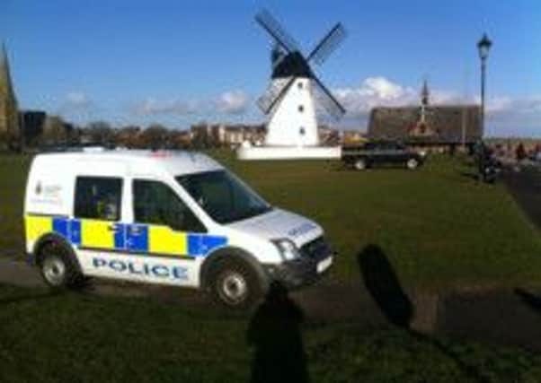Police at the scene in Lytham after a body was found on the foreshore
