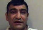 Munir Hussain - behind bars