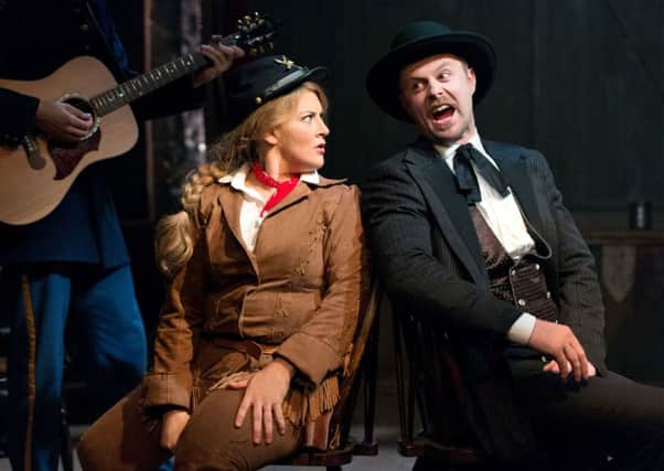 Jodie Prenger as Calamity Jane & Tom Lister as Wild  Bill Hickok. Photo credit Manuel Harlan