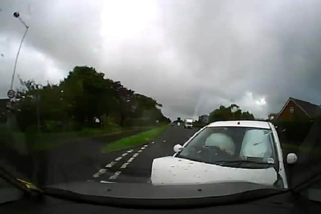 SMASH: Stills from his film of the car driving at his vehicle