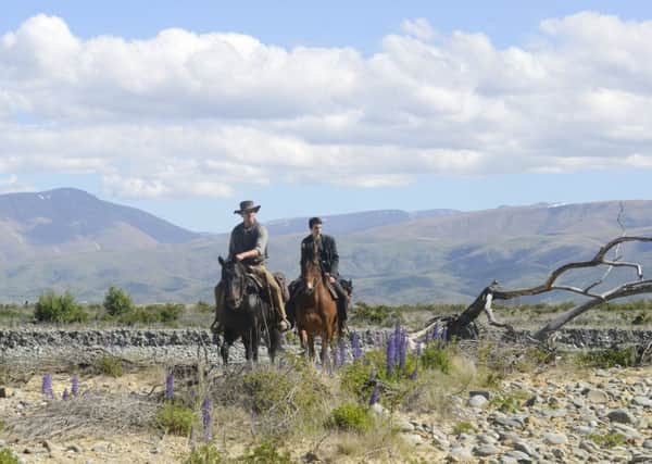 Slow West: Michael Fassbender as Silas and Kodi Smit-McPhee as Jay Cavendish