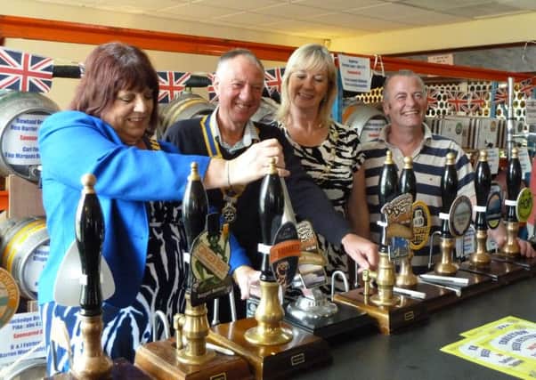 Pictured at last years event is Mayor of West Lancs, Doreen Stephenson, pouring the first pint