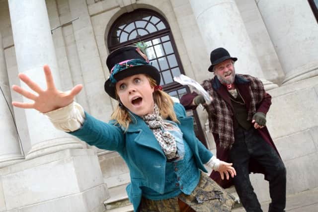 Josie Cerise as the Artful Dodger on the run with Russell Richardson who plays Fagin
