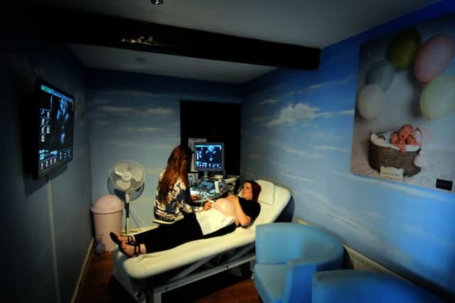 Baby:Boo 3D and 4D baby scans in Tarleton. near Preston
Business owner Katie Kermode conducts a scan of mum-to-be Layla MacMillan
