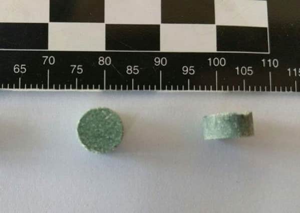 A green pill seized from the Kendal Calling music festival