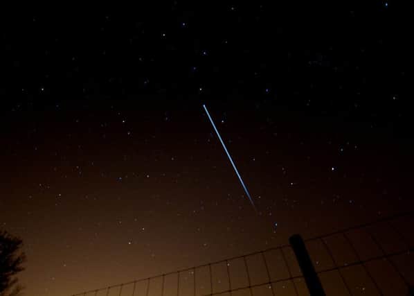 ISS in the night sky. Photo: Paul Williams, flickr.com/photos/pcw