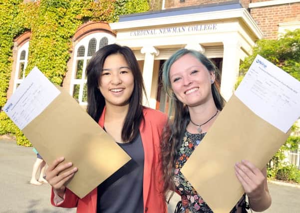 Oxbridge Girls. Jan-Kay Cheung (left) and Mary Curwen are going to Cambridge and Oxford respectively