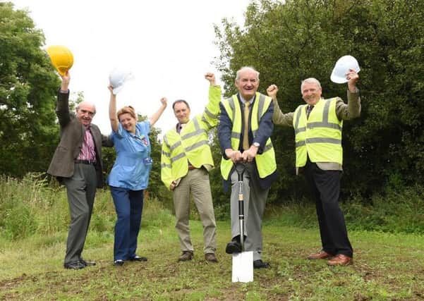 WORK: Hospice staff, councillors and council officers cut the first sod in the new park
