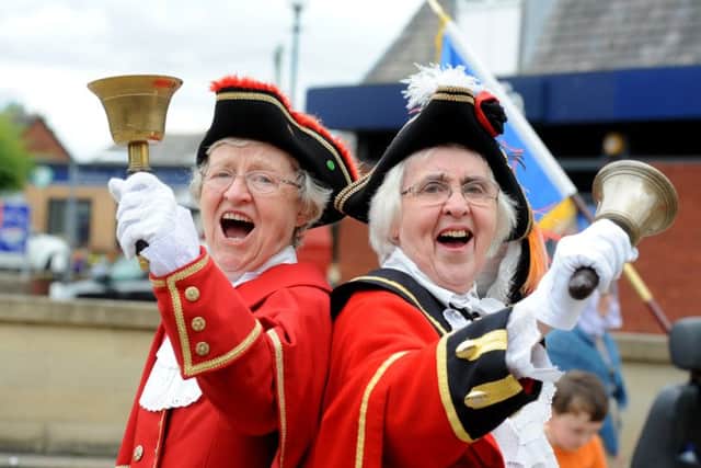 Here ye: Garstang town crier Hilary McGrath with sister Marjorie Dodds from Chester-le-Street.